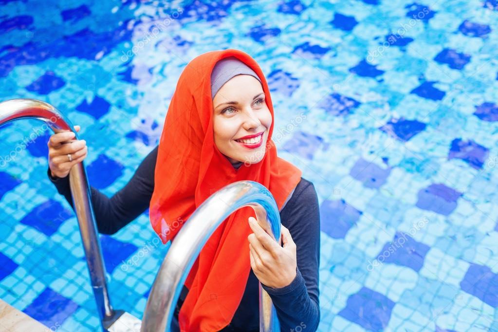 woman swimming in a swimming pool